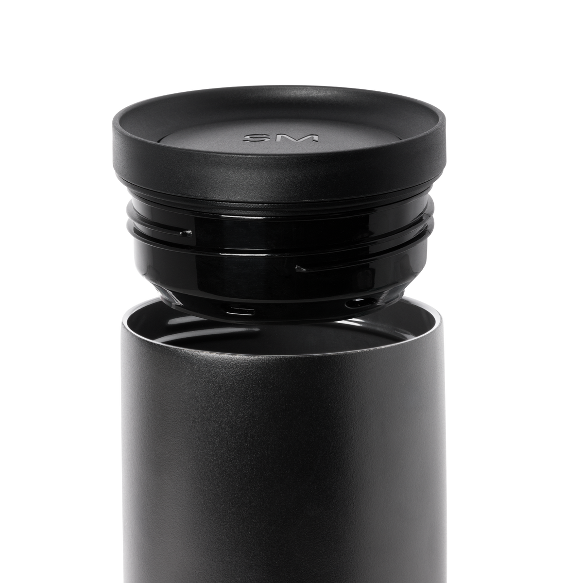 Dark gray cylindrical container with matte finish and removable black lid, shown against white background.